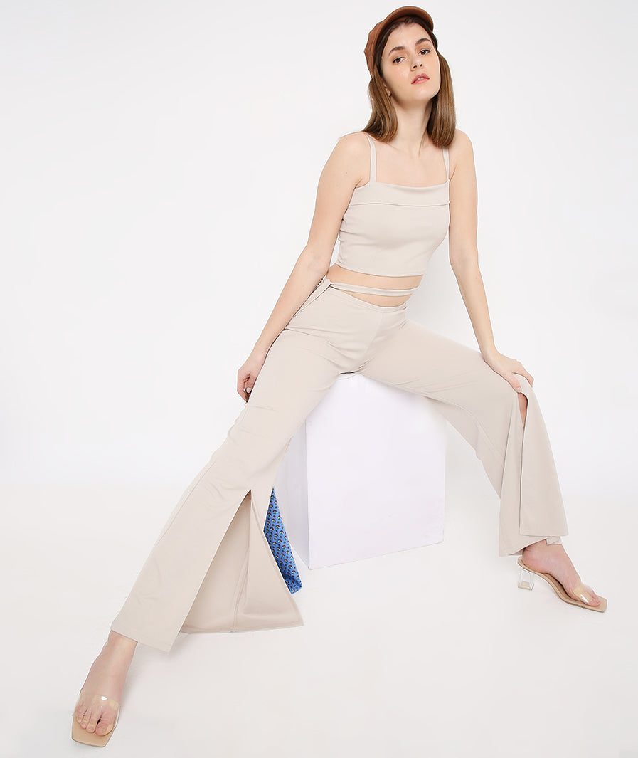 Back view champagne tie-up crop with front vent trousers
