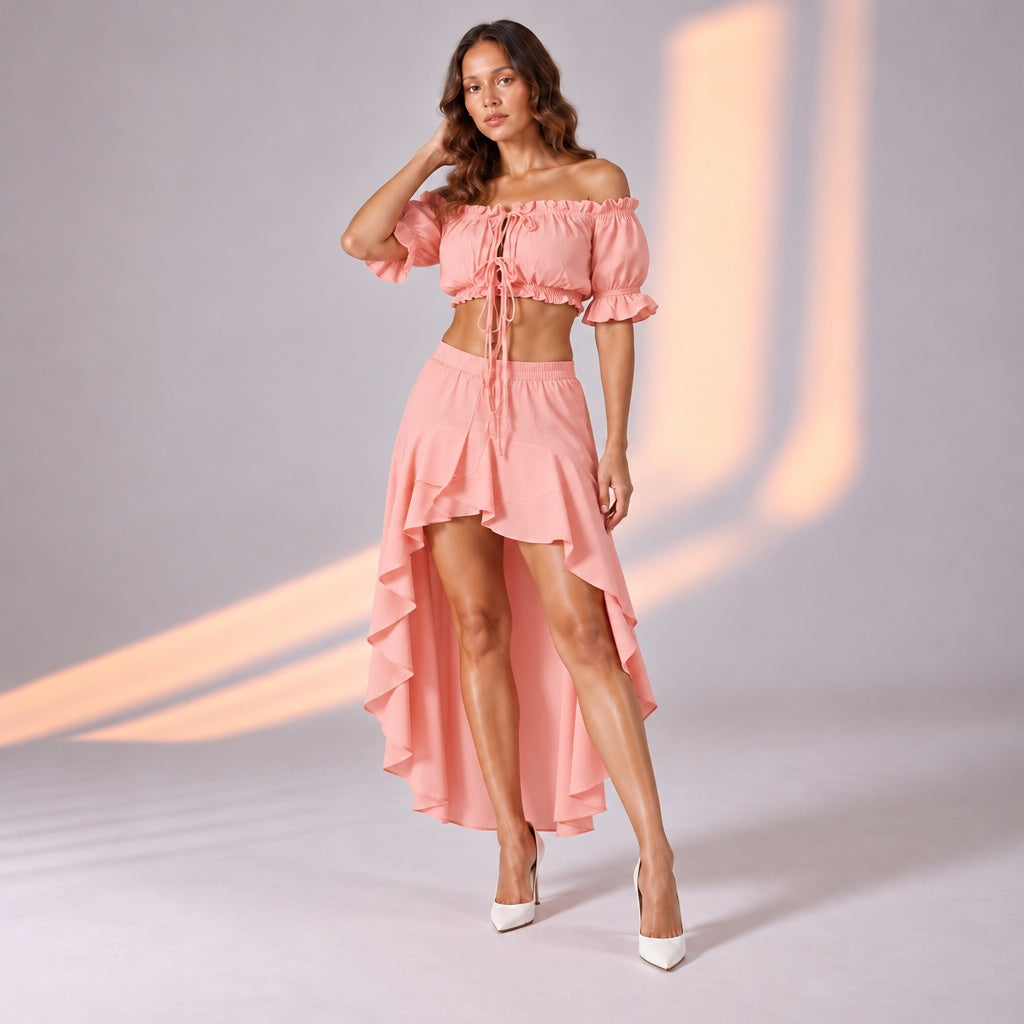Pink high low skirt set. Matching two piece outfit. Tiered ruffle maxi skirt. Off shoulder crop top set. Summer co ord set. Beach vacation resort wear. European fit skirt set. Romantic summer fashion. High low hem skirt. Pink vacation set. Bali fit vacation outfit. Chic resortwear.