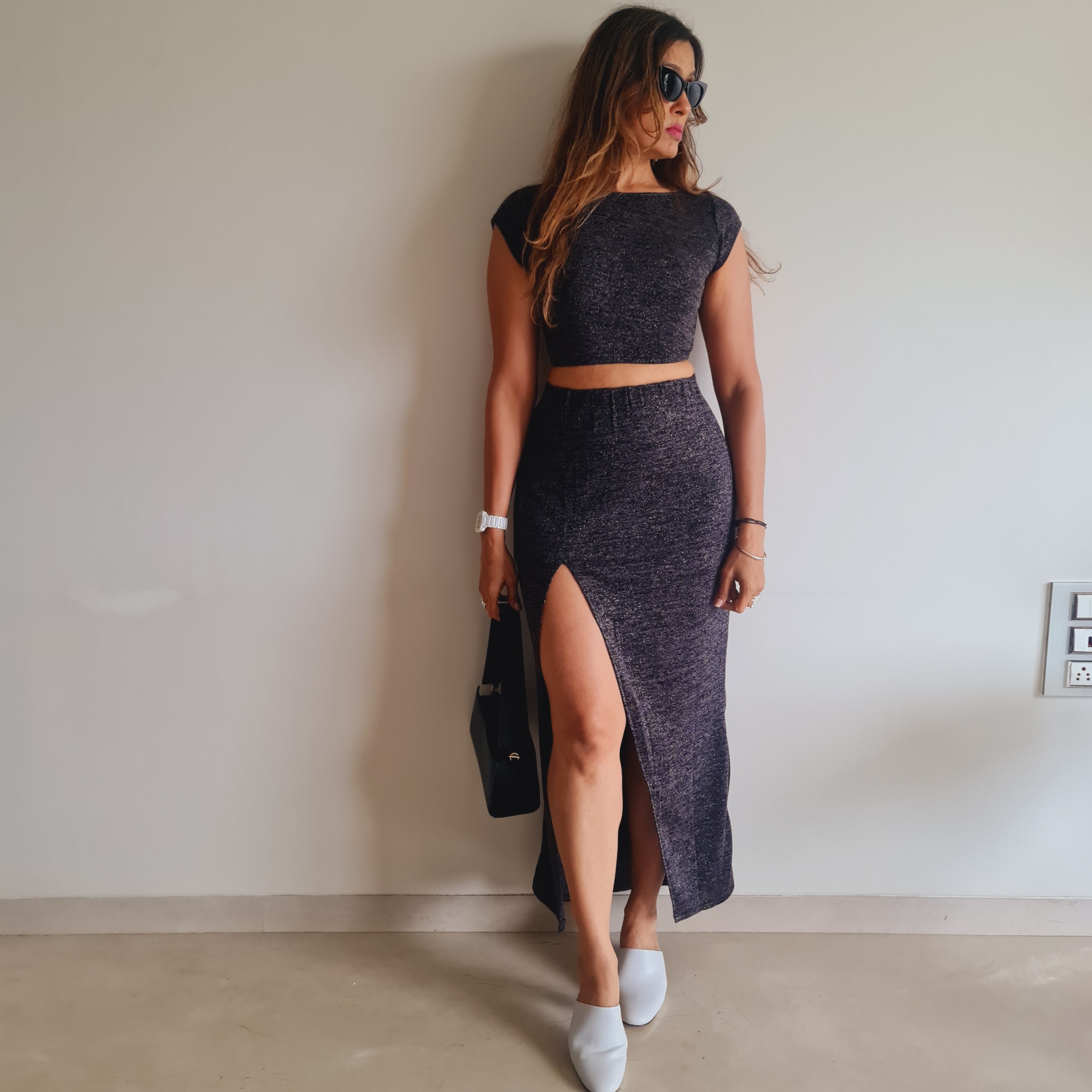 Black Shimmer Slit Long Skirt styled for party and vacation – print detail
