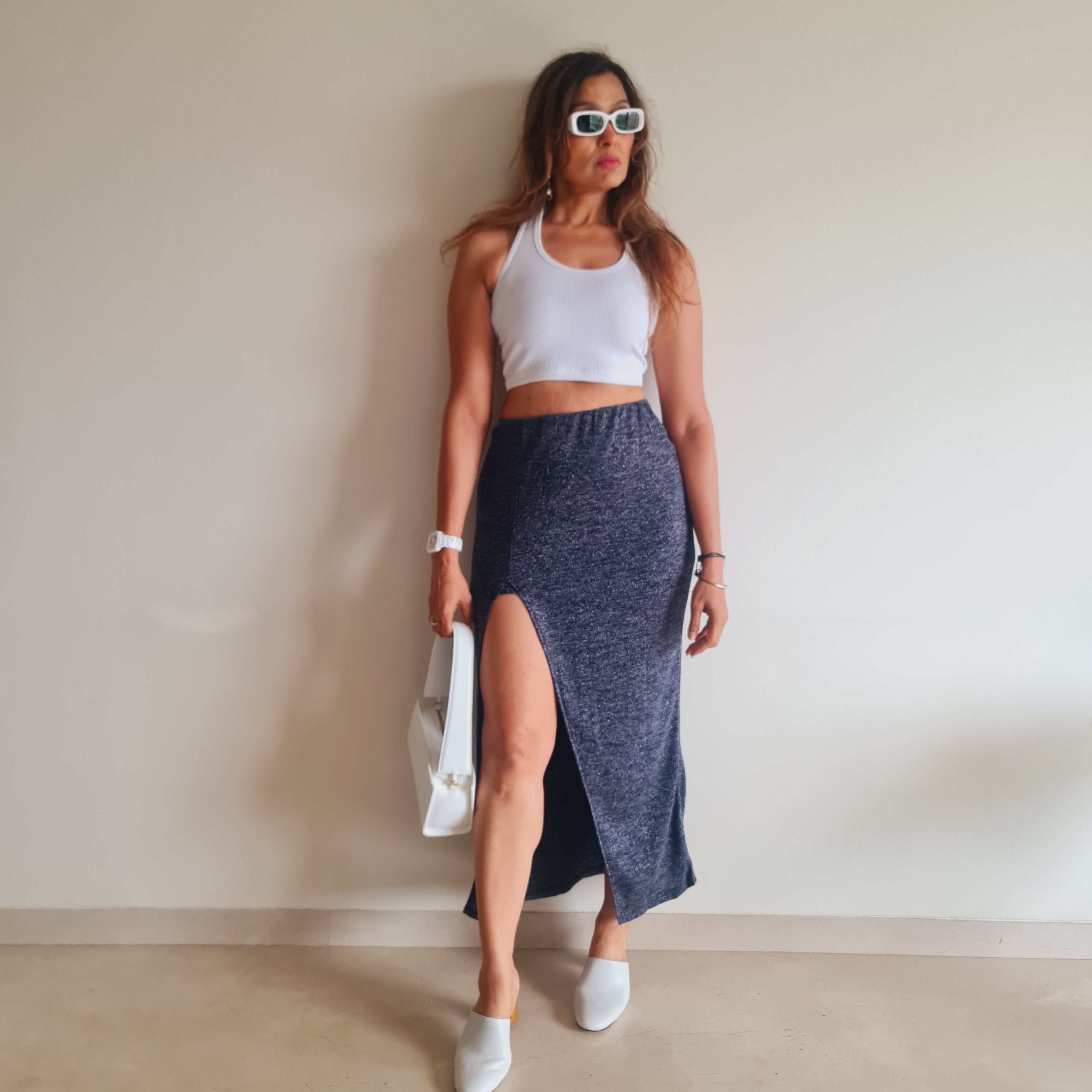 Blue Shimmer Slit Long Skirt styled for party and vacation – seated pose
