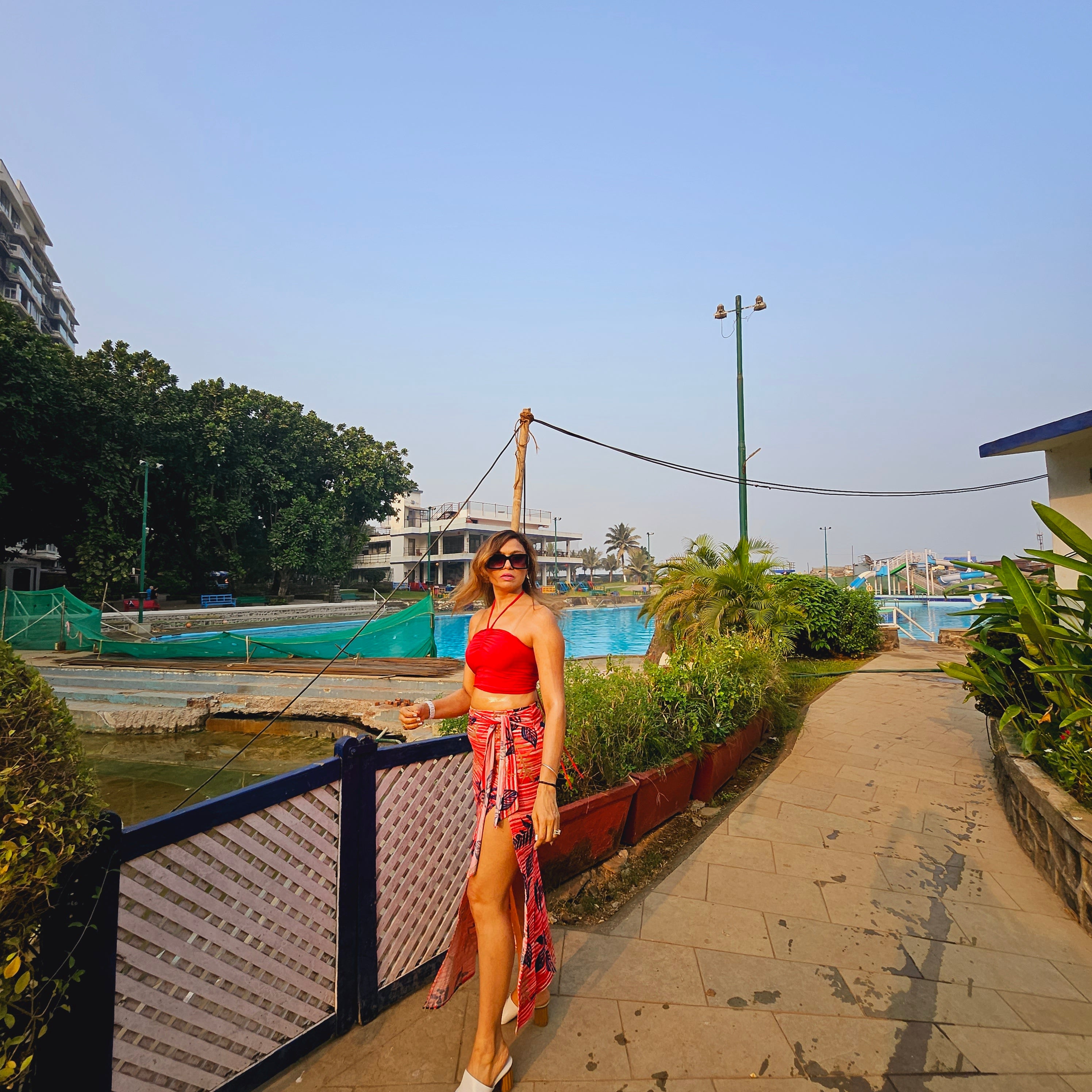 Red Bamboo Print Front Knot Midi Skirt styled for party and vacation – pair with crop top look
