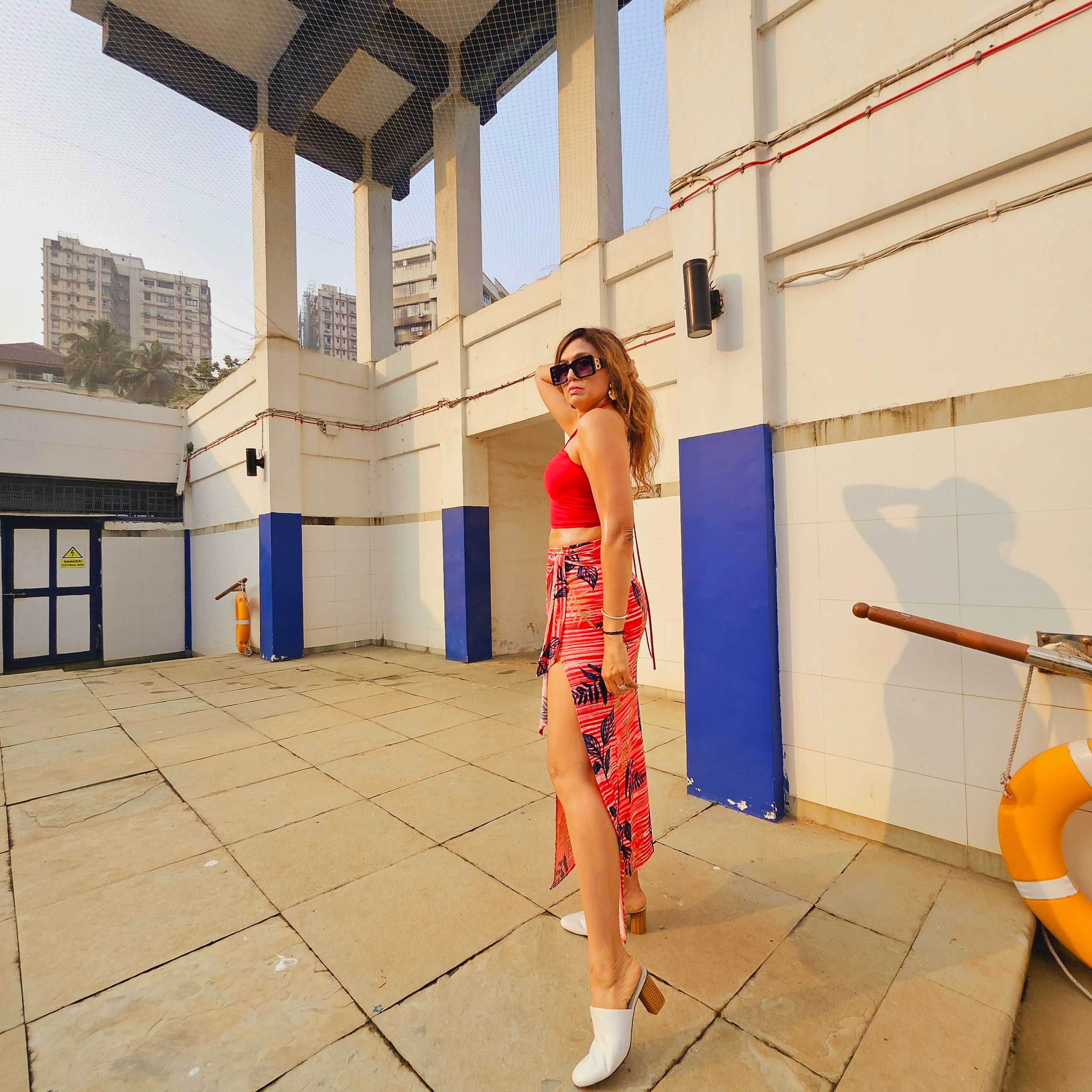 Red Bamboo Print Front Knot Midi Skirt styled for party and vacation – back view
