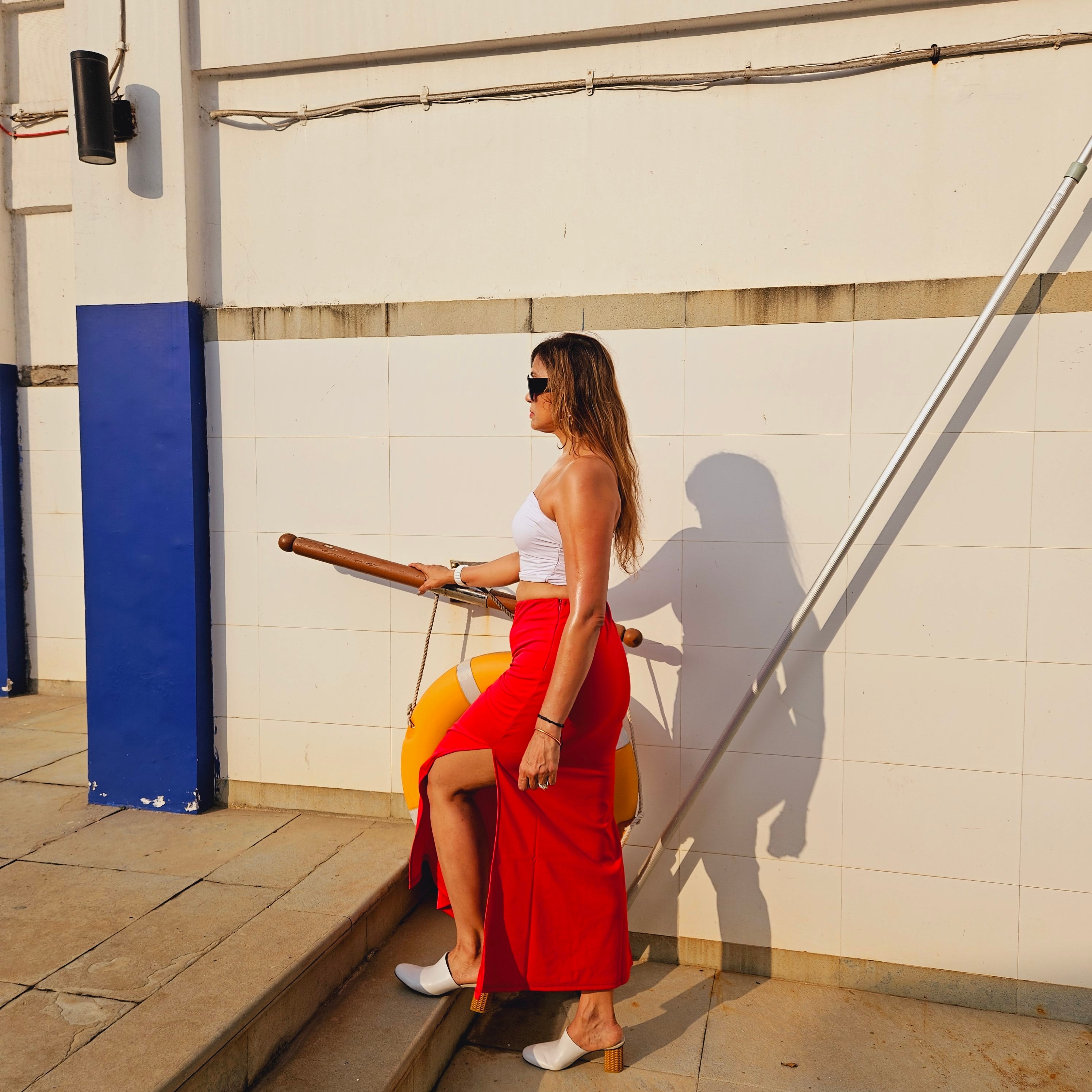 Red Cocktail Slit Skirt and Side Zip styled for party and vacation – knot / tie detail
