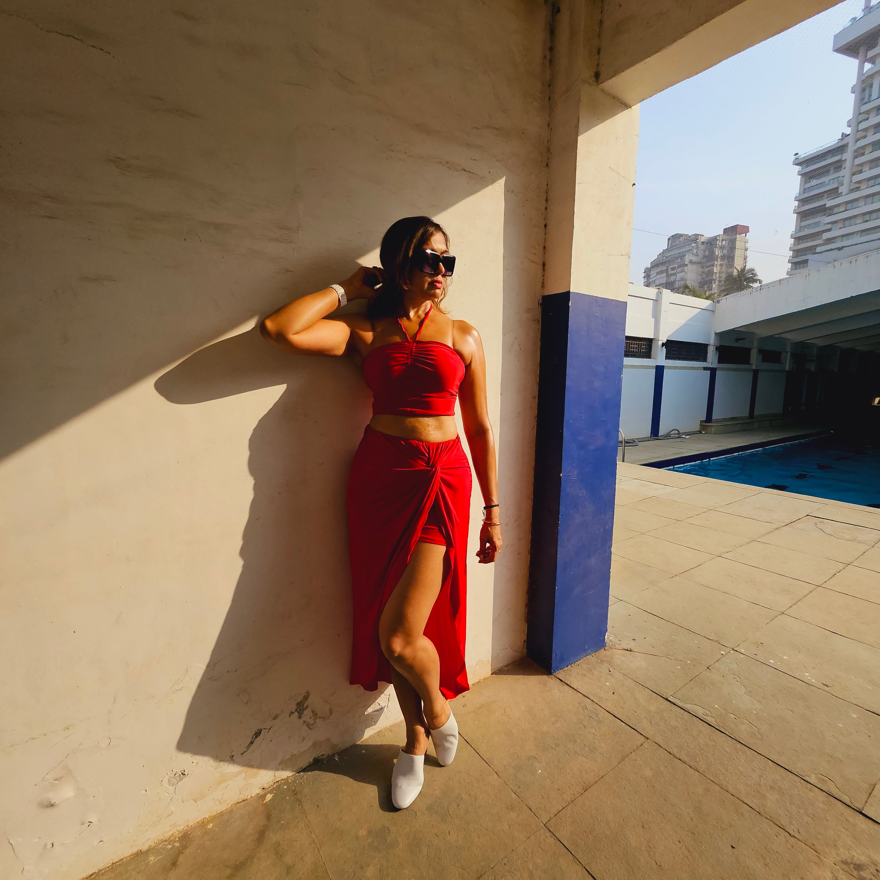 Red Dancer Midi Skirt styled for party and vacation – walking shot
