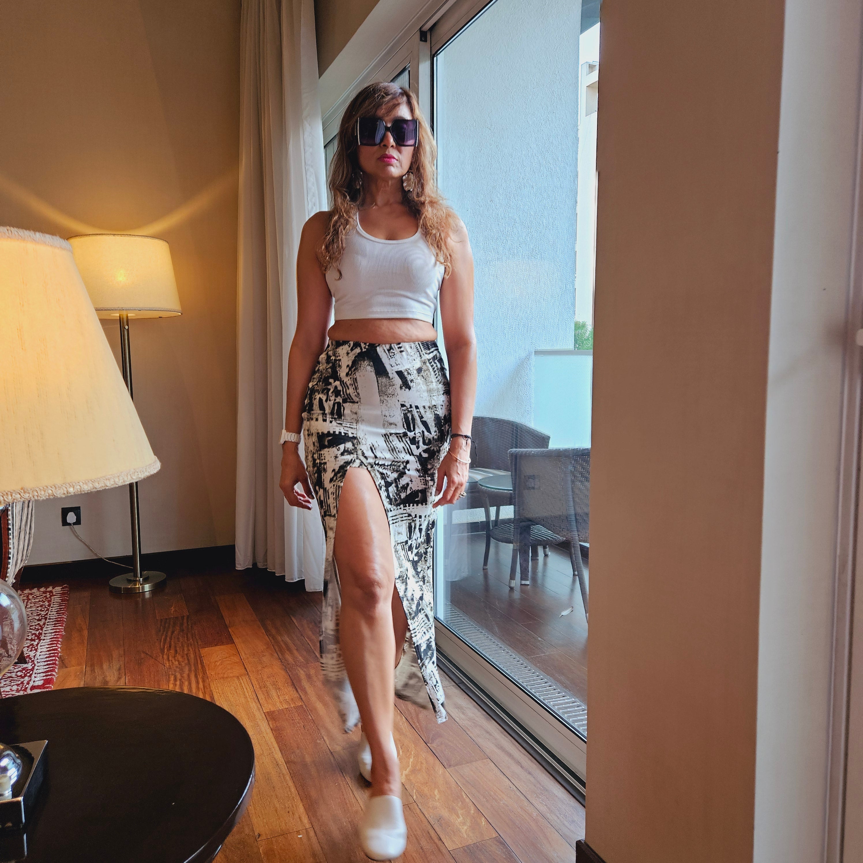 Tie Dye Slit Long Skirt styled for party and vacation – seated pose

