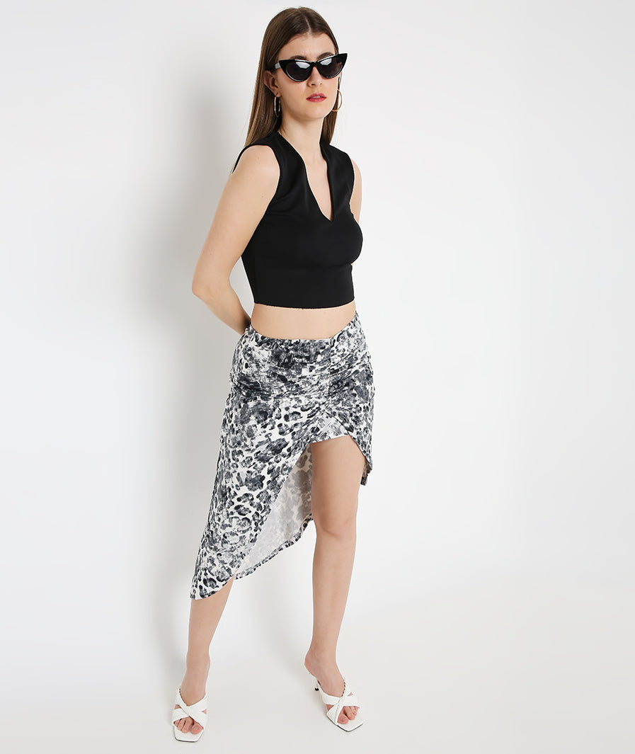 Marcel & Mae Animal Print Layered Midi Skirt, slit movement shot, red midi skirt
