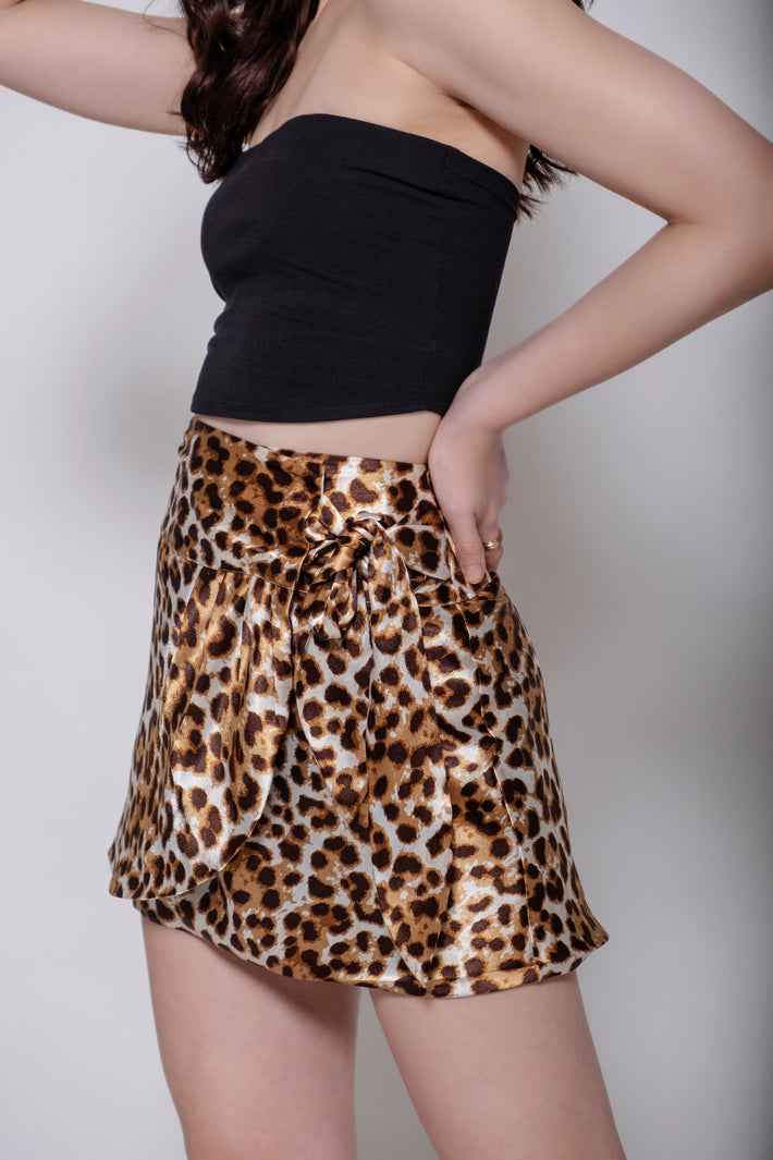 statement mini skirt: Animal Print Wraparound Mini Skirt (vacation styling)
