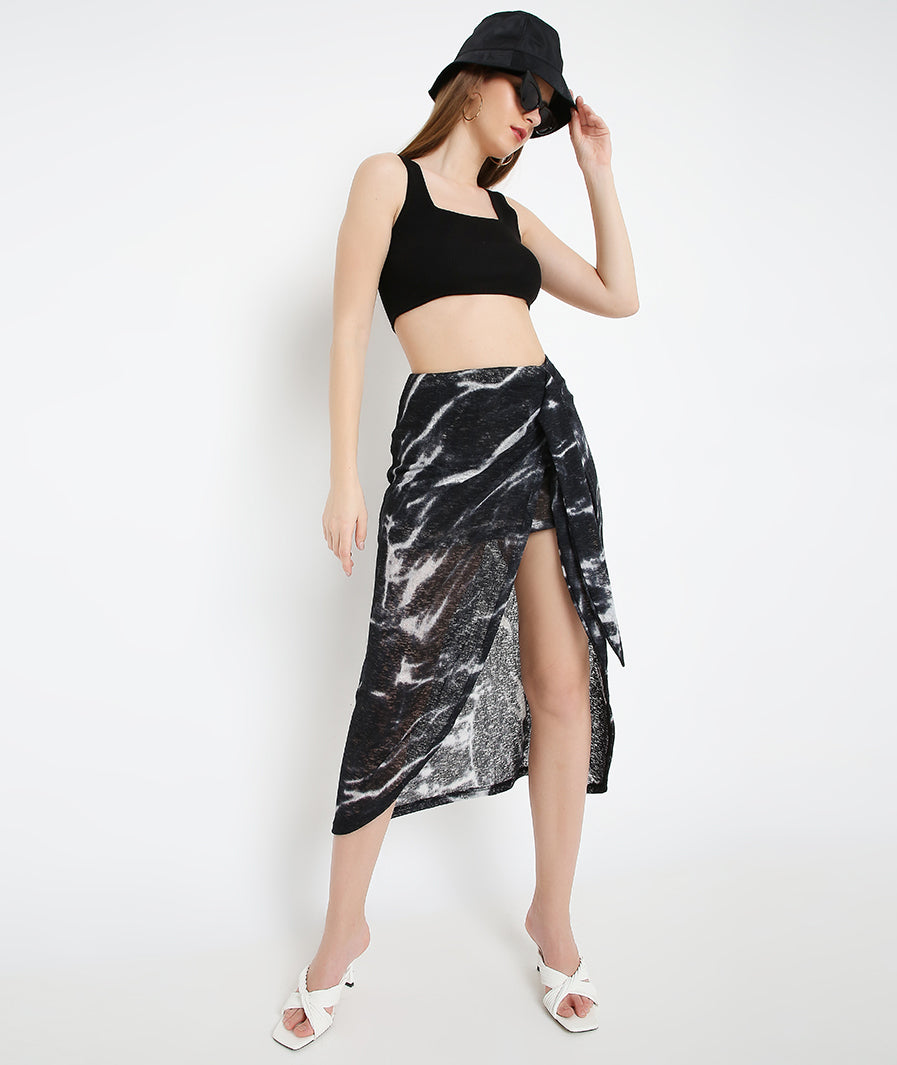 Wraparound Black Long Skirt styled for party and vacation – side angle
