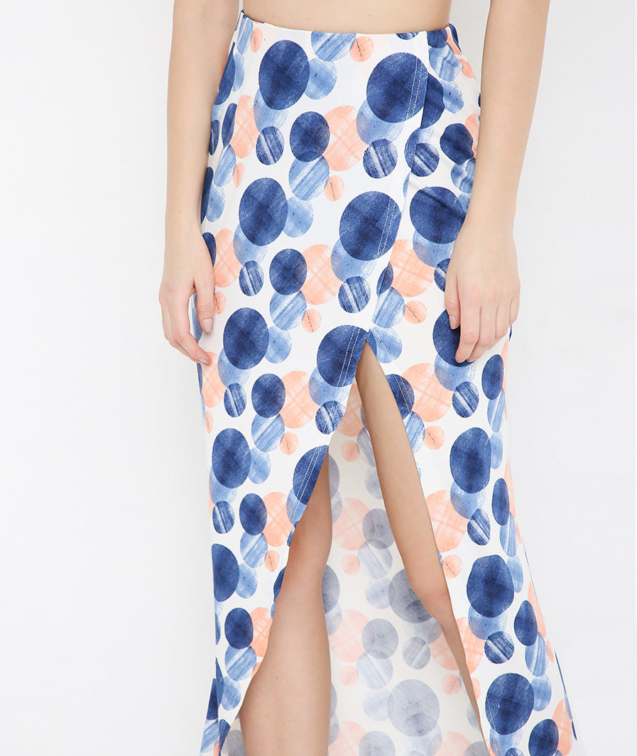 Marcel & Mae Large-Circle Print Long Tulip Blue Skirt, seated pose, blue long skirt
