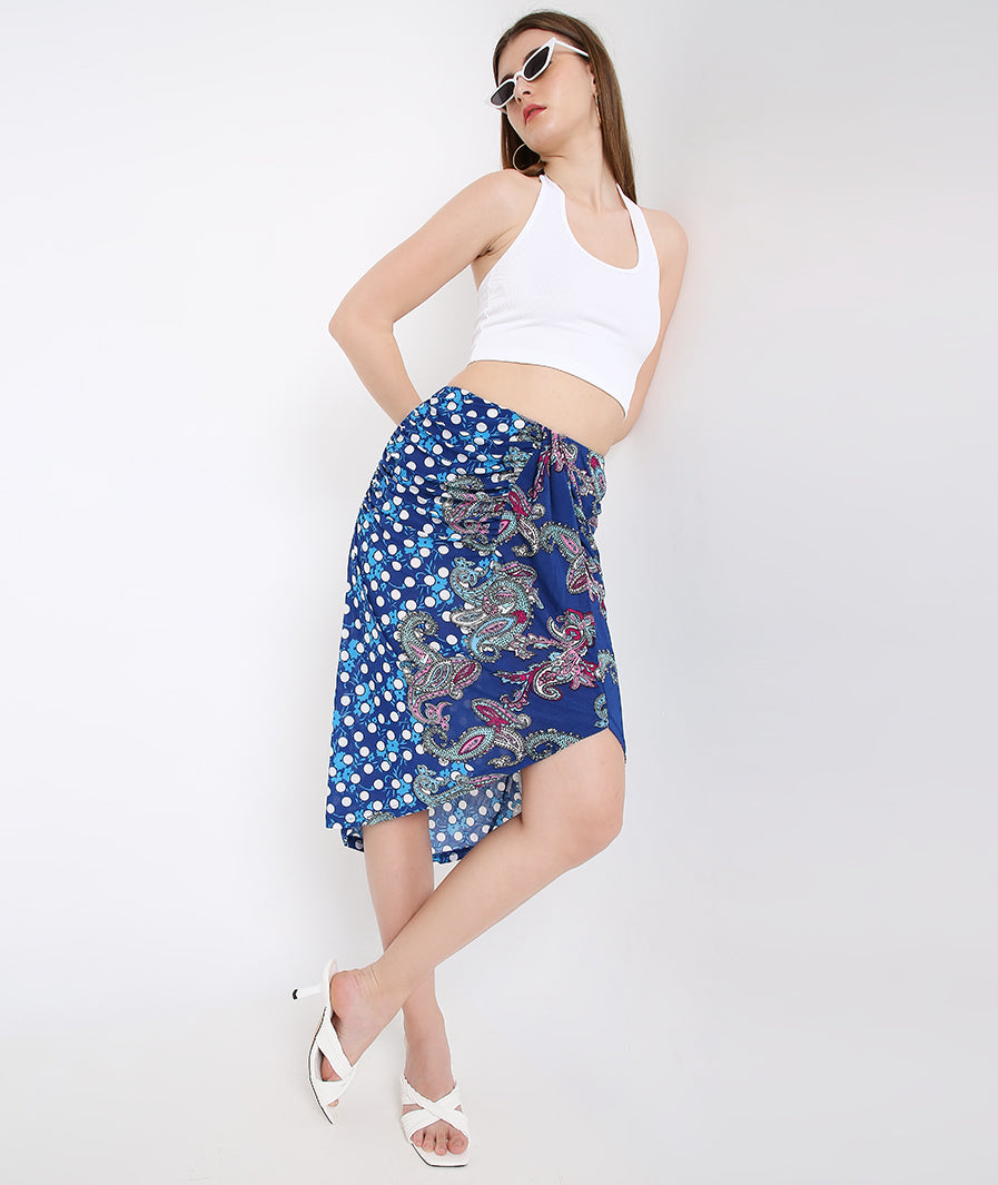 Blue Paisley Sarong Long Skirt styled for party and vacation – texture close-up
