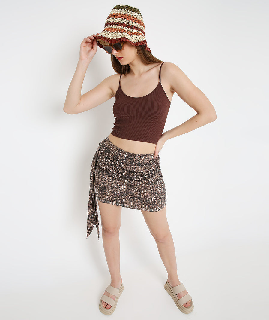 hem detail of Brown scaly animal print Sashed Mini Skirt – soft stretch western skirt, Marcel & Mae
