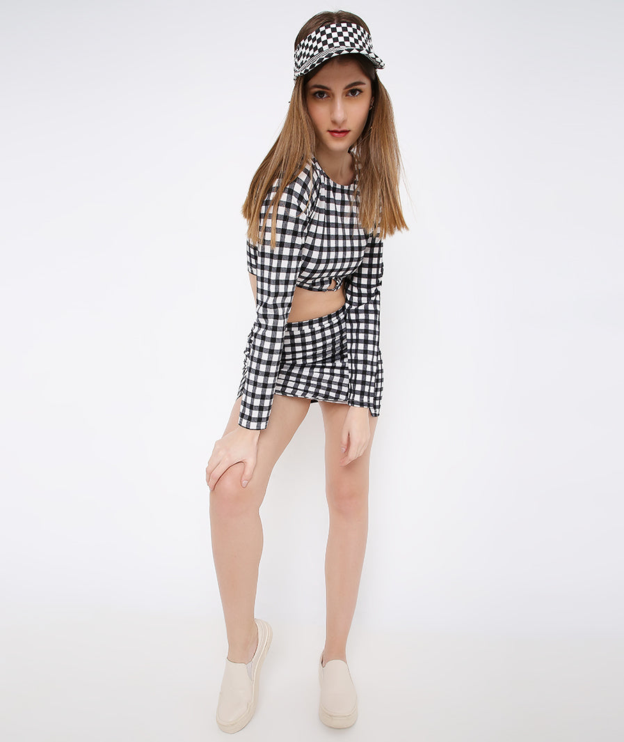 Marcel & Mae Check Print Mini Skirt, seated pose, statement mini skirt

