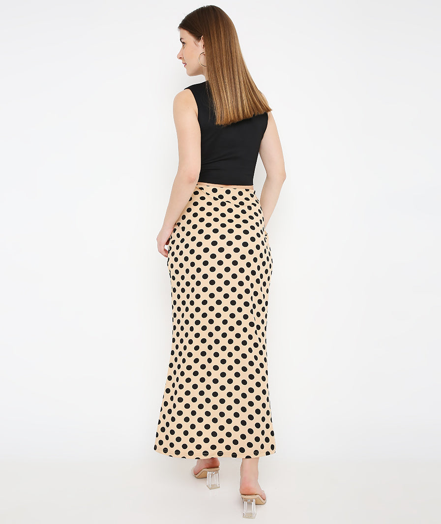 cream long skirt: Cream Polka Long Tulip Skirt for Women for Women (walking shot) (9)
