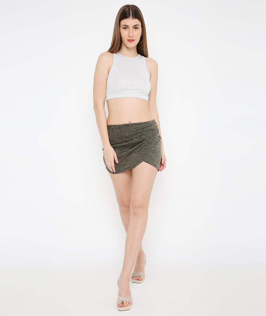 green mini skirt: Green Shimmer Mini Skirt (hem detail)
