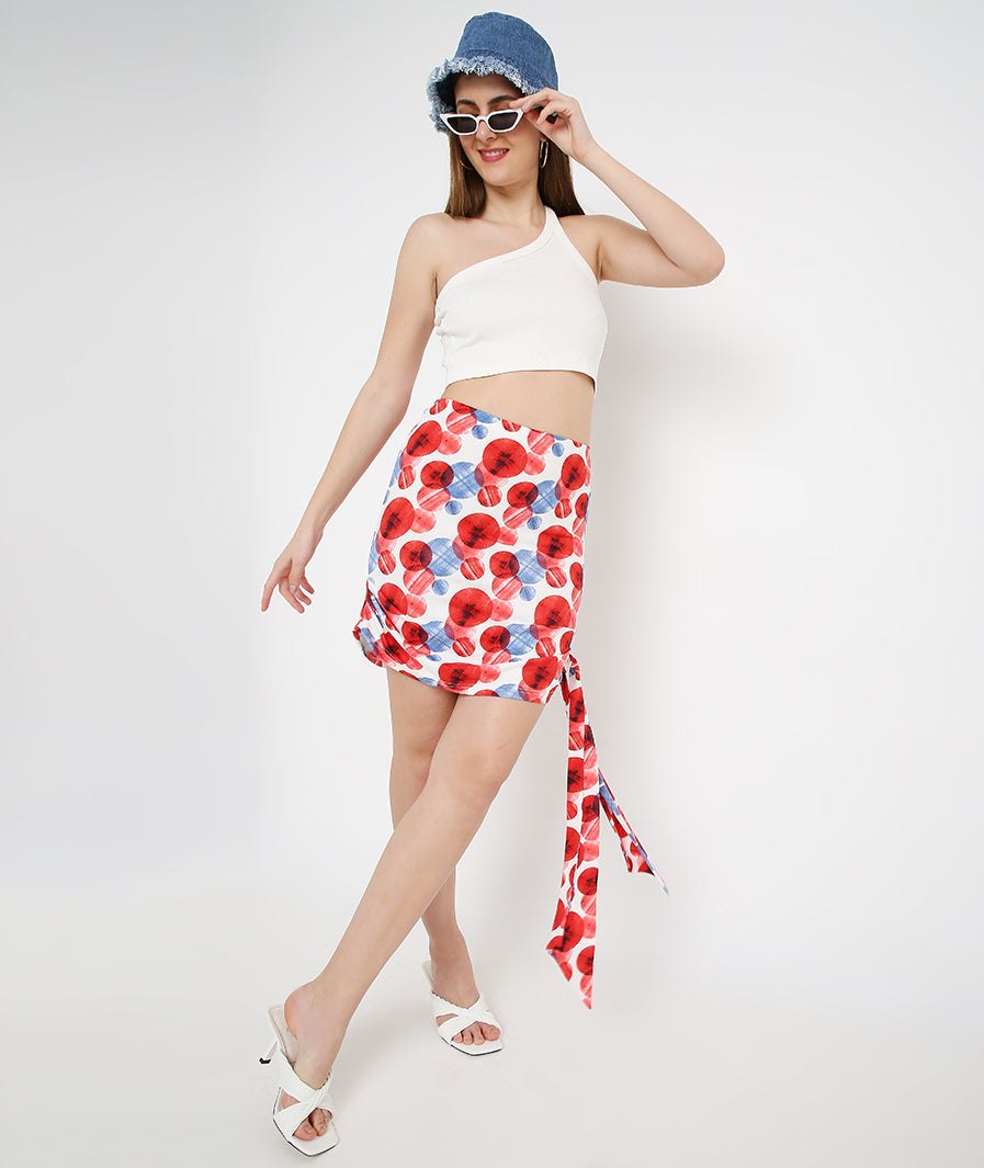 Marcel & Mae Large Circles Mid Length Knotted Mini Skirt, front view, statement mini skirt
