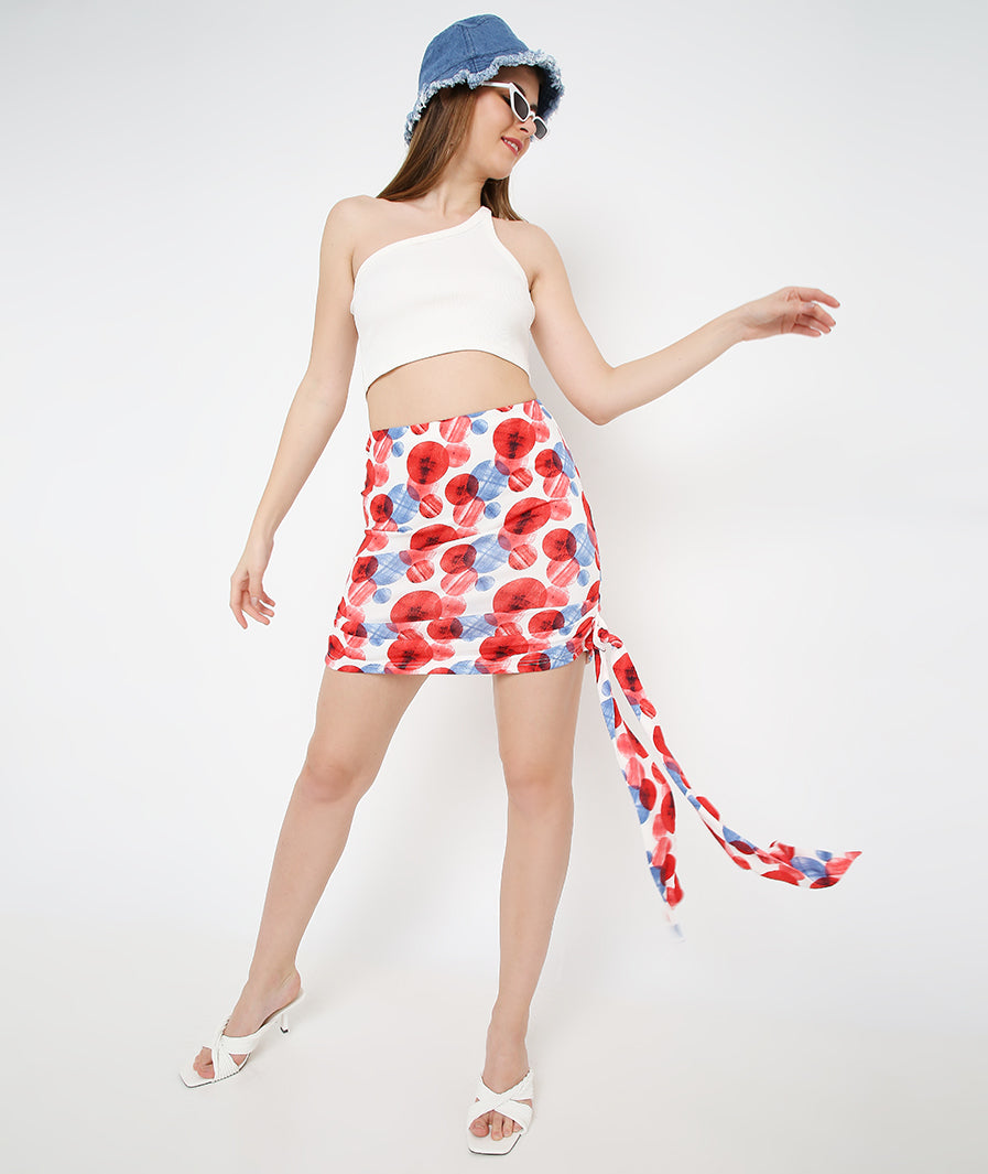 statement mini skirt: Large Circles Mid Length Knotted Mini Skirt (waist detail)
