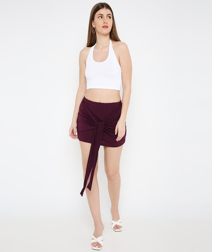 mauve mini skirt: Mauve Front Tie Mini Skirt for Women for Women (walking shot)

