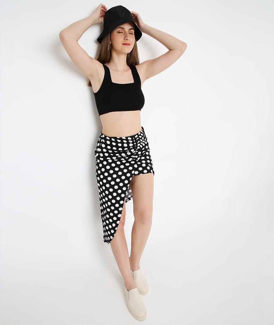 Polka-Dot Midi Skirt styled for party and vacation – slit movement shot
