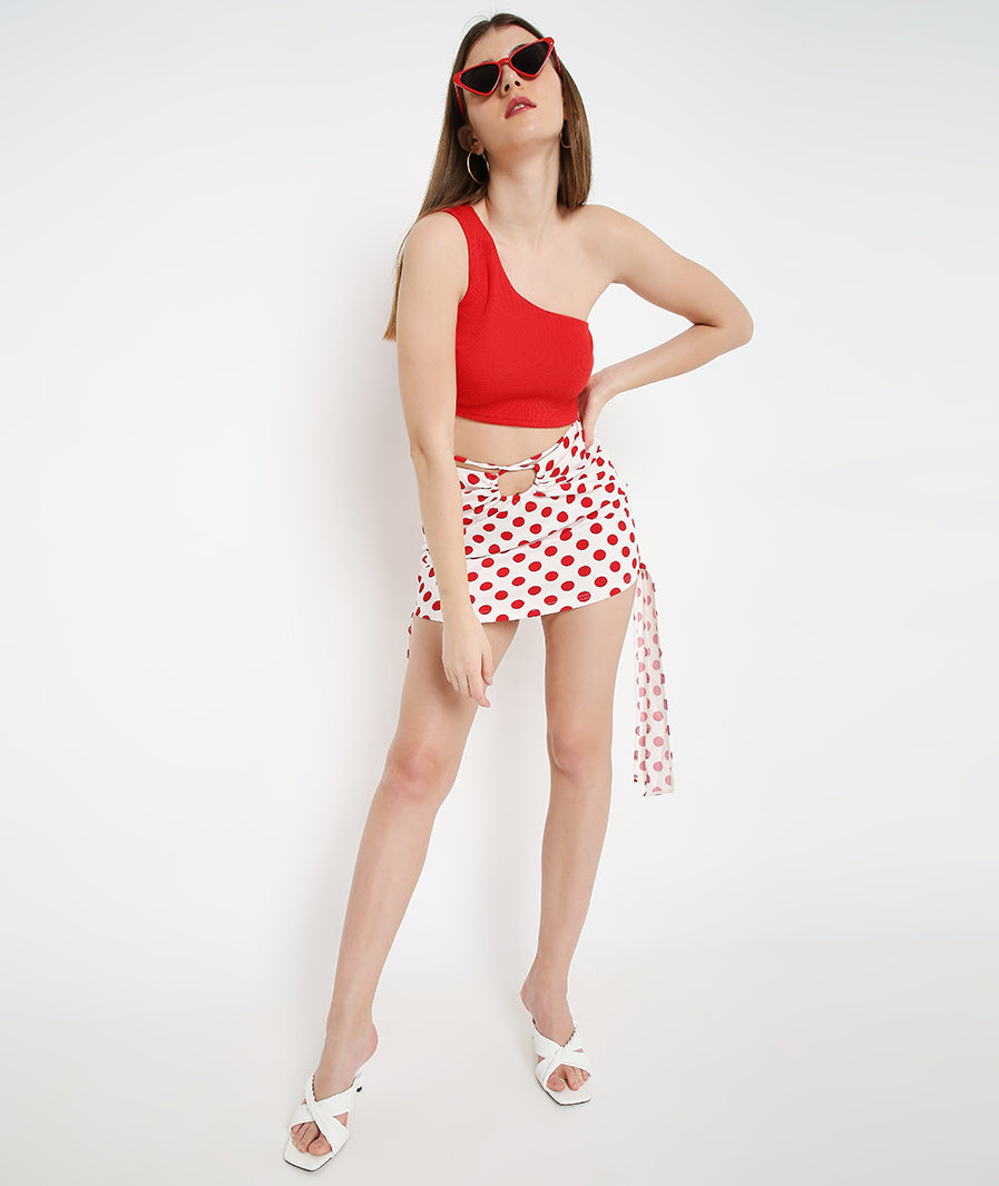 Marcel & Mae Red Polka Cut-Out Mini Skirt, slit movement shot, red mini skirt
