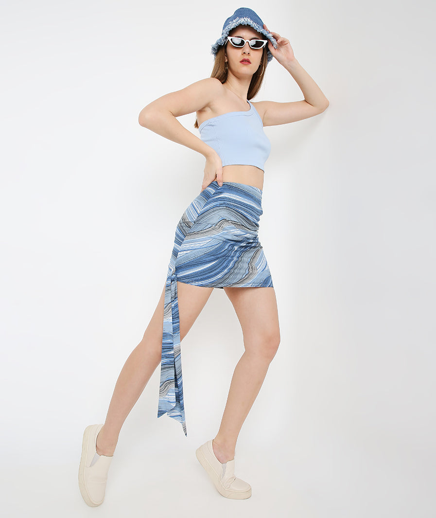 walking shot of Waves Layered Mini Skirt with Knotted Sash Skirt – soft stretch western skirt, Marcel & Mae
