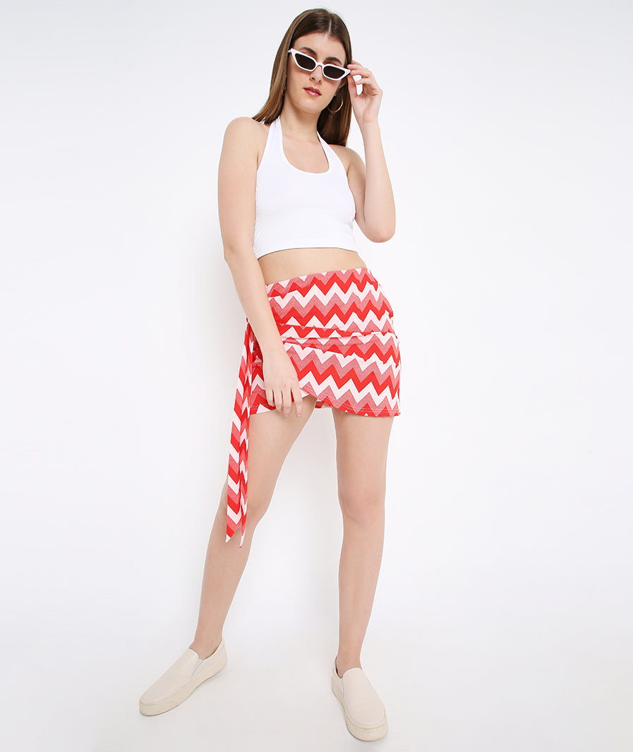 Zig Zag Sarong Mini Skirt styled for party and vacation – seated pose
